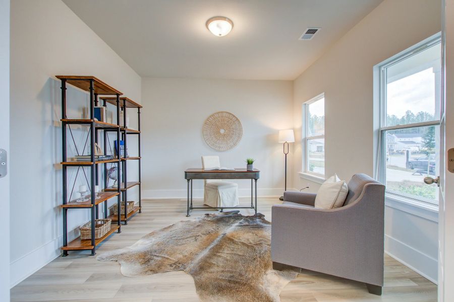 Furnished interior in a model home at Watson Hill in Summerville (Image 27). Furnished interior in a model home at Watson Hill in Summerville (Image 27).