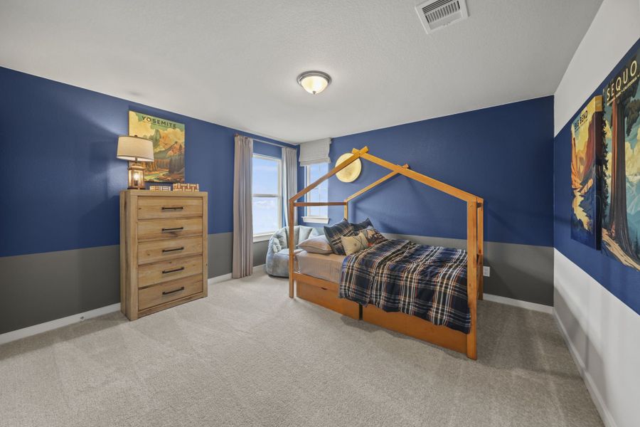 Furnished interior in a model home at Grand Magnolia in Magnolia (Image 29).