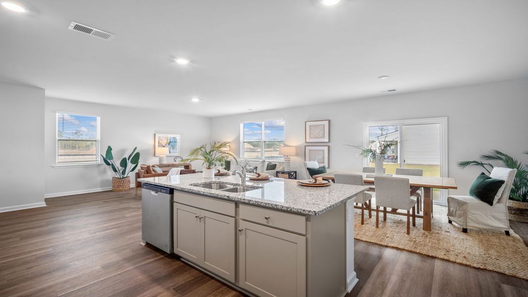 Furnished interior in a model home at The Groves at Bees Creek in Ridgeland (Image 16).