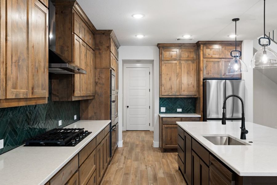 Furnished interior in a model home at Lola Creek Ranch in Boyd (Image 57).