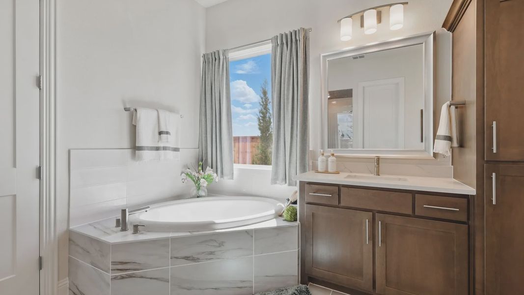 Experience luxury with sleek marble tiles and rich wood cabinetry in Rio Vista at Kelly Ranch. Experience luxury with sleek marble tiles and rich wood cabinetry in Rio Vista at Kelly Ranch.