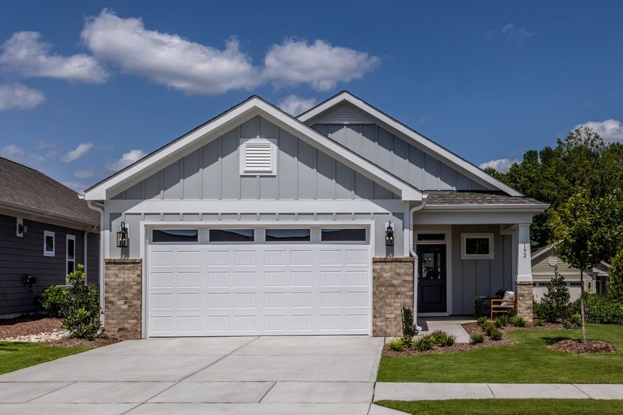 Front exterior of a home in the The Walk at East Village community, located in Clayton, NC (Image 5). Front exterior of a home in the The Walk at East Village community, located in Clayton, NC (Image 5).