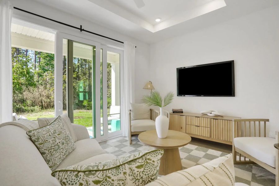 Furnished interior in a model home at Seminole Trace - Villas in Palm Coast (Image 17).