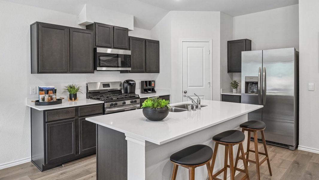 Furnished interior in a model home at Three Oaks in Sherman (Image 6).
