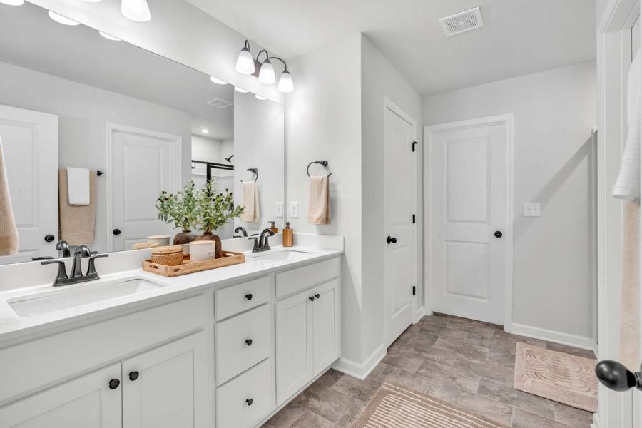 Furnished interior in a model home at Sweetlake Grove in Mableton (Image 20).