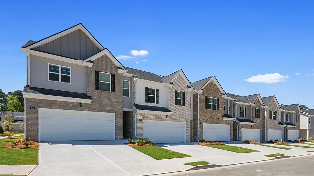 Front exterior of a home in the Independence Villas and Townhomes community, located in Loganville, GA (Image 5).