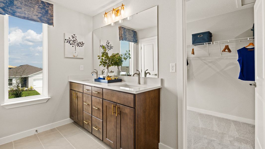 Primary Suite En Suite Bath with Dual Sinks and Premium Fixtures New Home in Liberty Trace by DRB Homes in Haines City, FL Primary Suite En Suite Bath with Dual Sinks and Premium Fixtures New Home in Liberty Trace by DRB Homes in Haines City, FL
