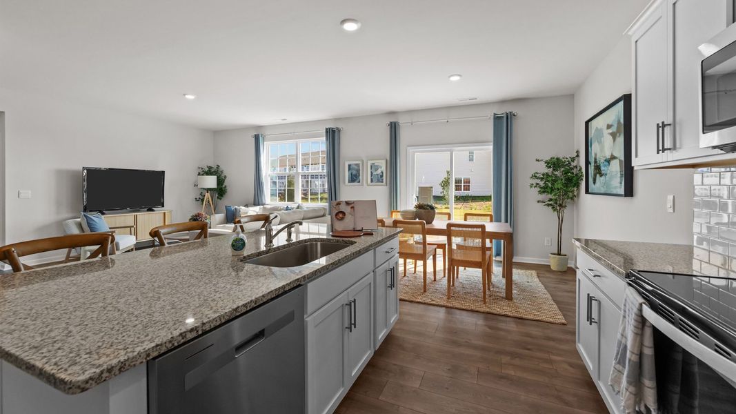 Furnished interior in a model home at Ridgewood Farms in Winterville (Image 19).