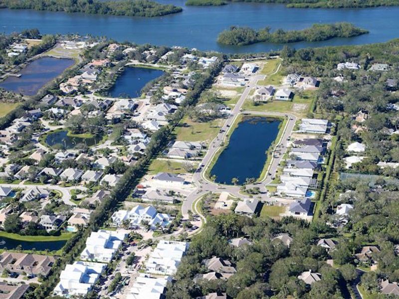 Aerial view of the The Strand community in Vero Beach, FL, showing layout and nearby surroundings (Image 26).