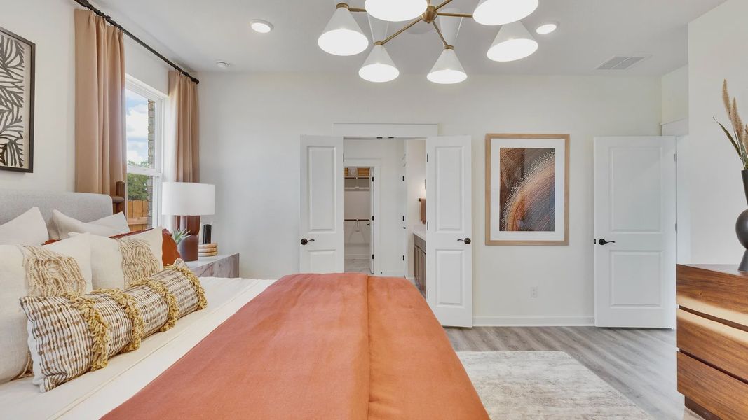 Furnished interior in a model home at Creeks Crossing in Elgin (Image 32).