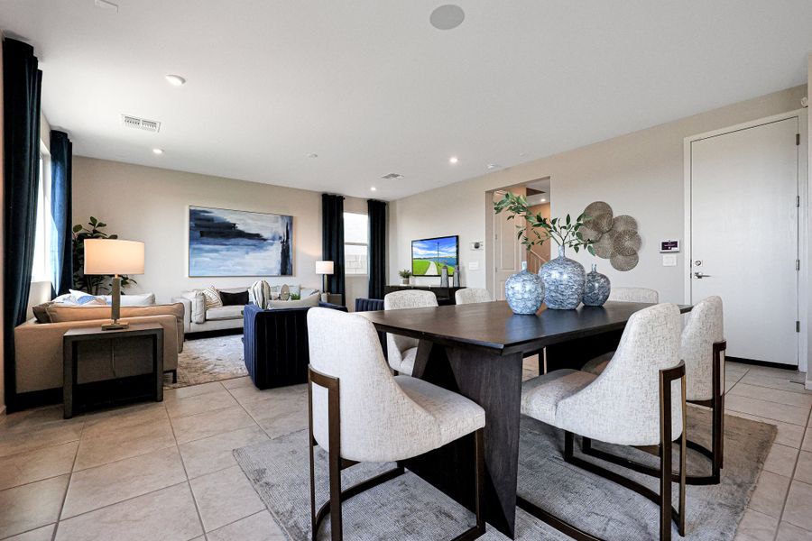 A room with a table and chairs. A room with a table and chairs.