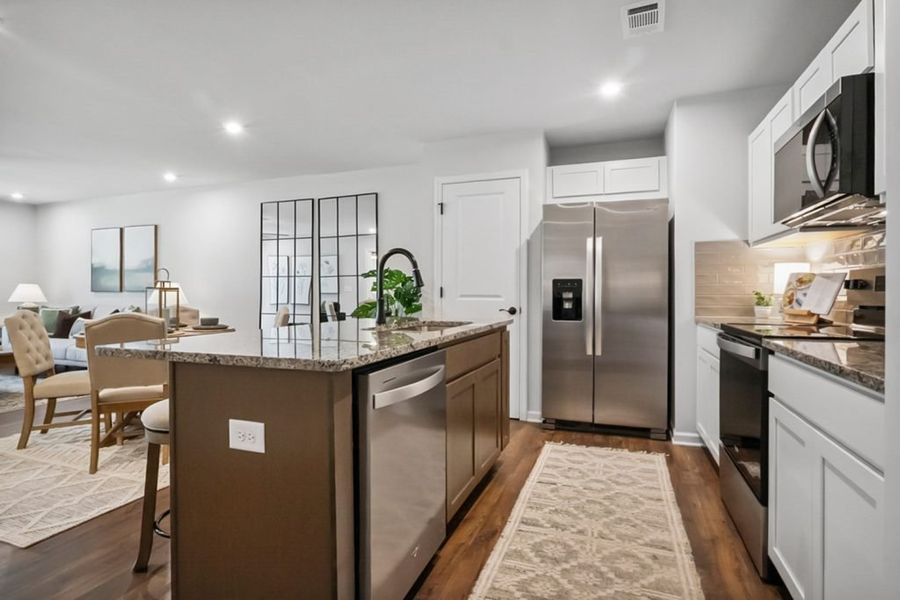 Furnished interior in a model home at Silver Leaf in Dawsonville (Image 9). Furnished interior in a model home at Silver Leaf in Dawsonville (Image 9).