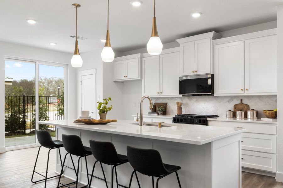 Furnished interior in a model home at Willow Grove Townhomes in Melissa (Image 13). Furnished interior in a model home at Willow Grove Townhomes in Melissa (Image 13).