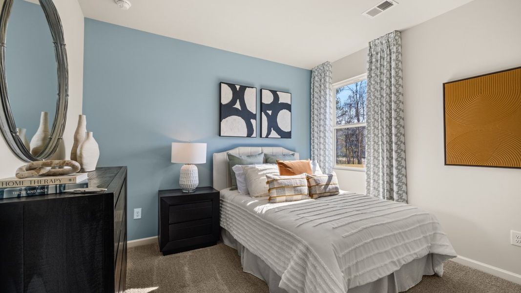 Furnished interior in a model home at WillowBrook in Winder (Image 18).