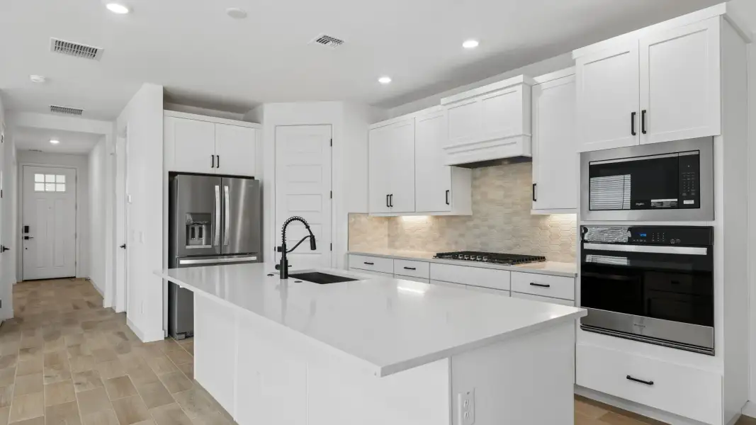 Furnished interior in a model home at Oak Park Manor Signature Homesites in Phoenix (Image 7).