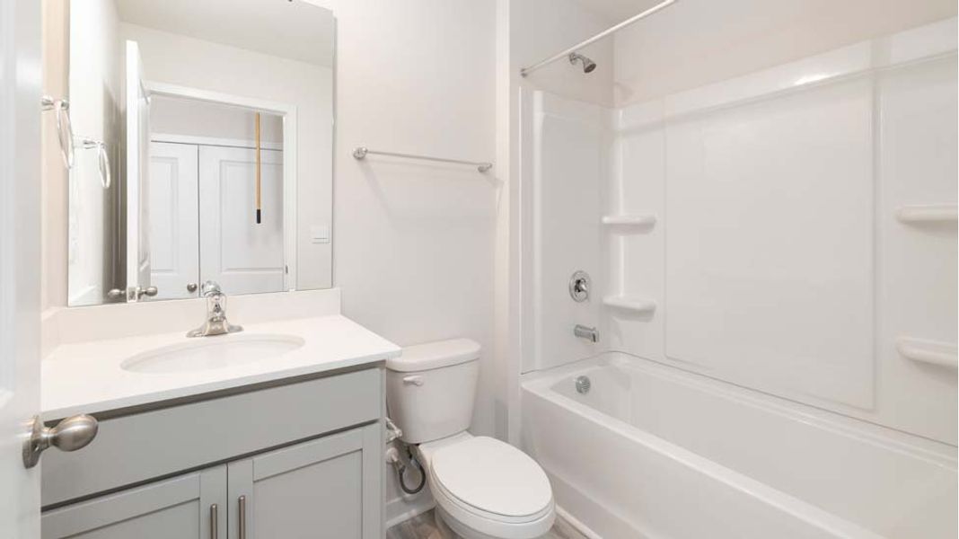 Furnished interior in a model home at The Townes at Troutman in Troutman (Image 14).