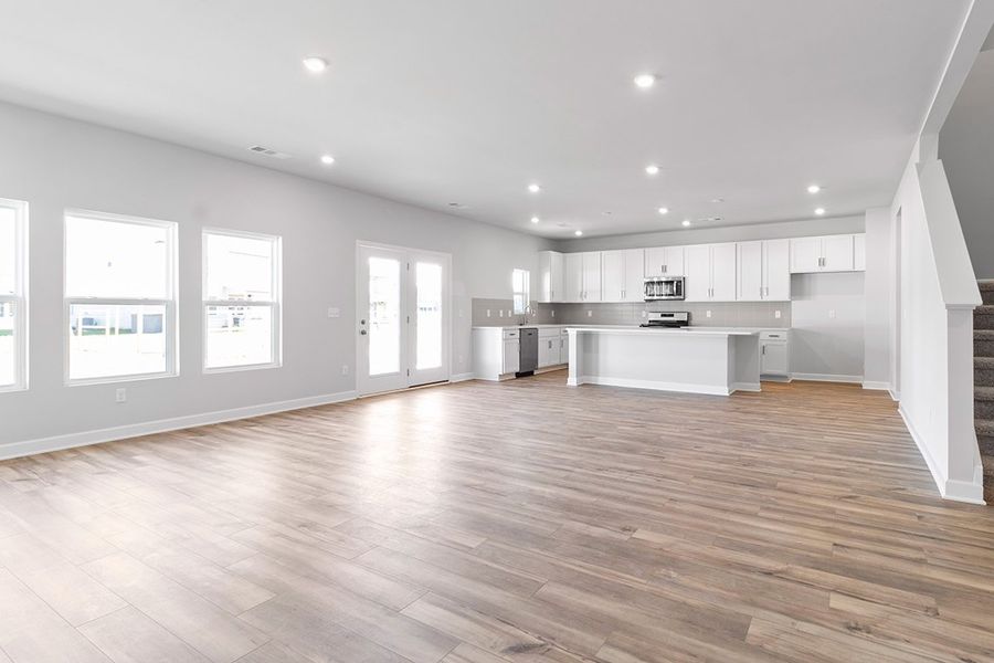 A large empty kitchen. A large empty kitchen.