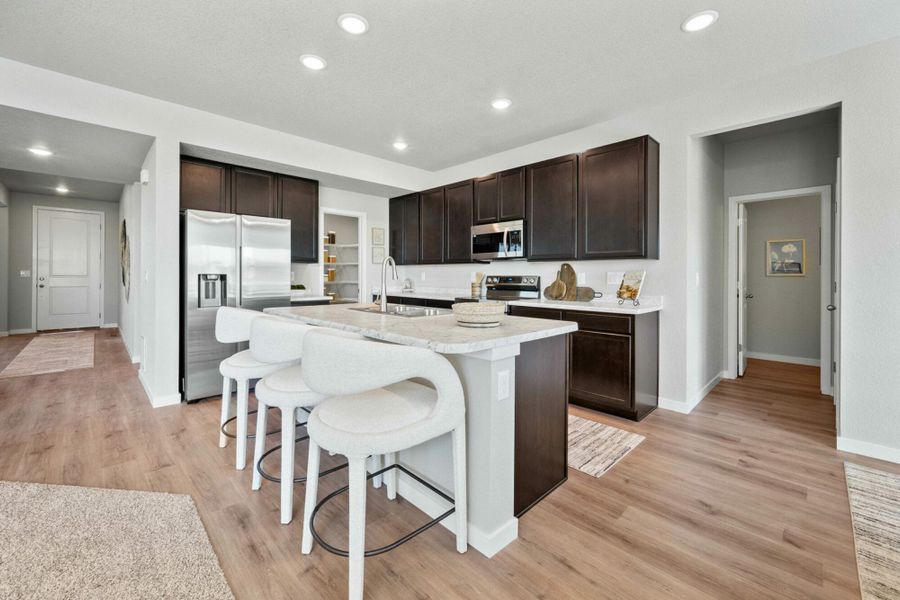 Furnished interior in a model home at Aspen Ranch in Fountain (Image 1).