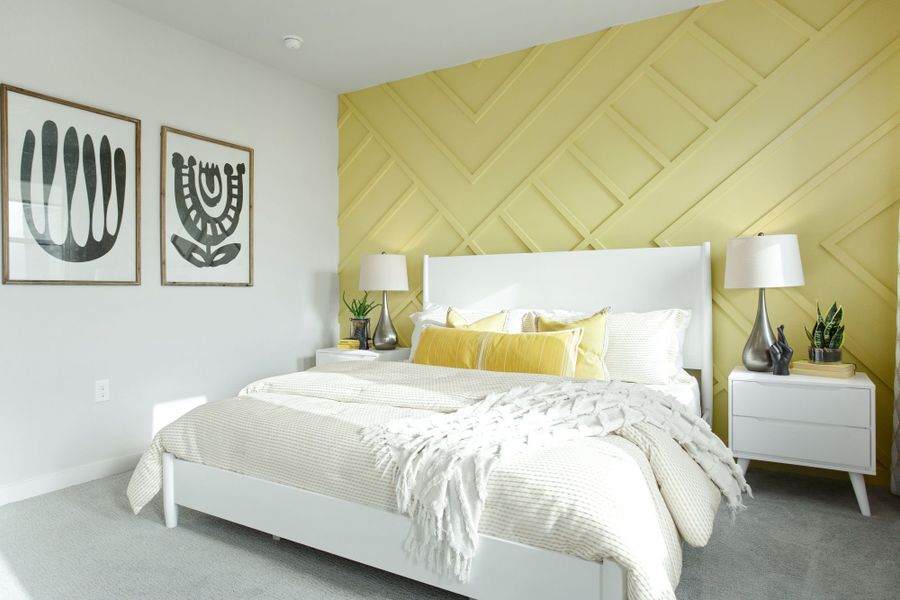 Furnished interior in a model home at Windsong Ranch Townhomes in Prosper (Image 4).