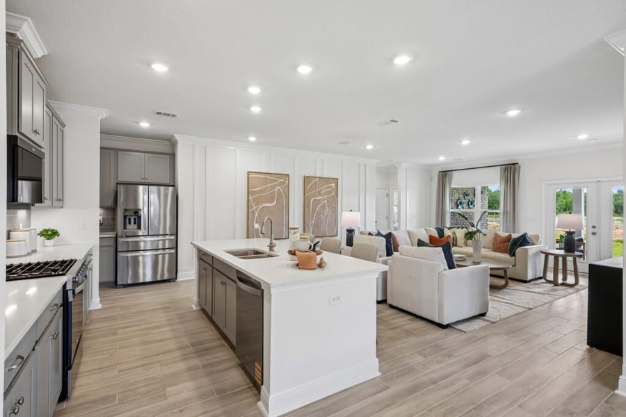 Furnished interior in a model home at Mahogany At Jubilee in Pace (Image 6).