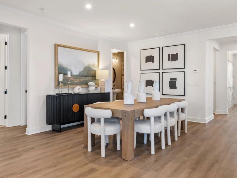 Furnished interior in a model home at Fern Hollow in Buford (Image 7).