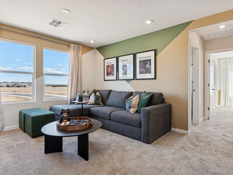 A living room with a large window.