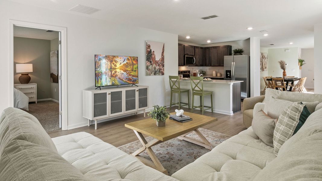Furnished interior in a model home at Copes Landing in Jacksonville (Image 54).