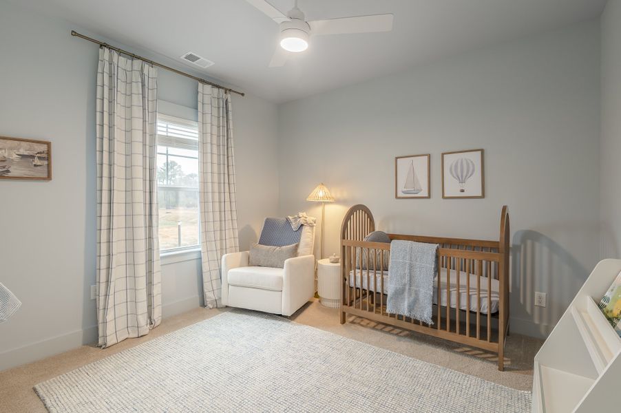 Furnished interior in a model home at Founder's Park in Summerville (Image 28).