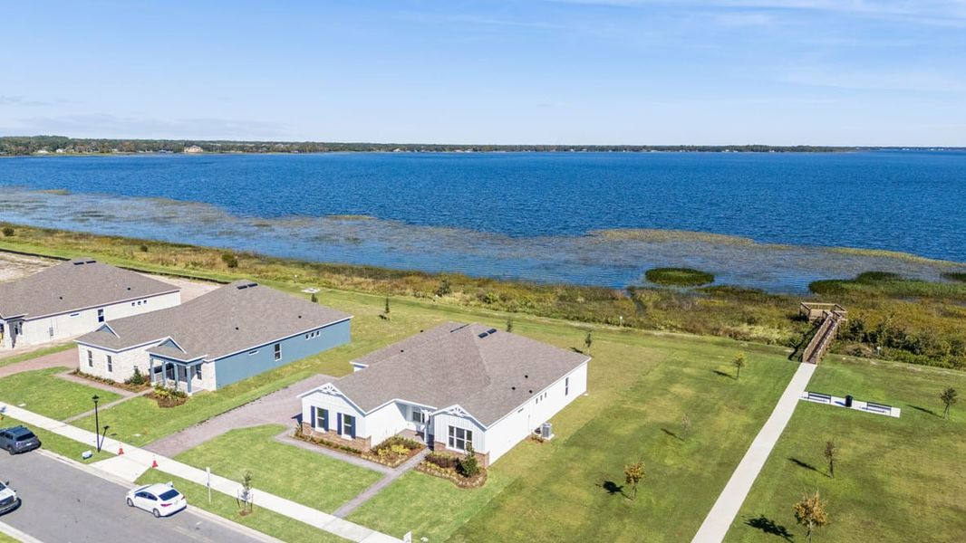 Aerial view of the Buena Lago community in St. Cloud, FL, showing layout and nearby surroundings (Image 1).