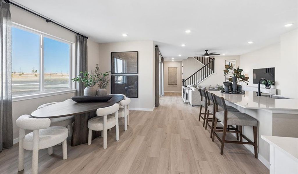 Furnished interior in a model home at The Duos at Looking Glass in Parker (Image 38).