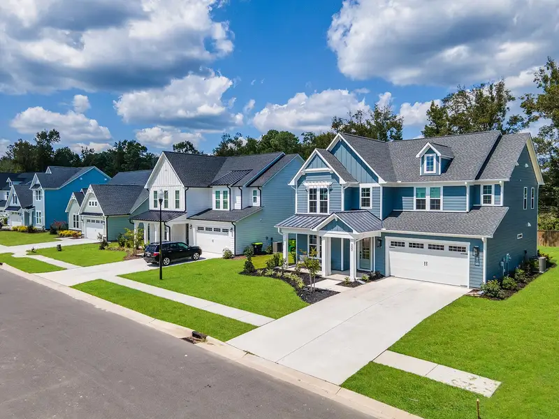 Aerial view of the Windwater community in Hampstead, NC, showing layout and nearby surroundings (Image 1). Aerial view of the Windwater community in Hampstead, NC, showing layout and nearby surroundings (Image 1).