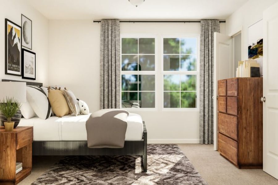 A living room with a couch and a table.