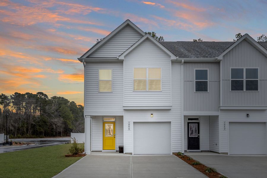 Front exterior of a home in the The Knoll at White Oak community, located in Garner, NC (Image 2). Front exterior of a home in the The Knoll at White Oak community, located in Garner, NC (Image 2).