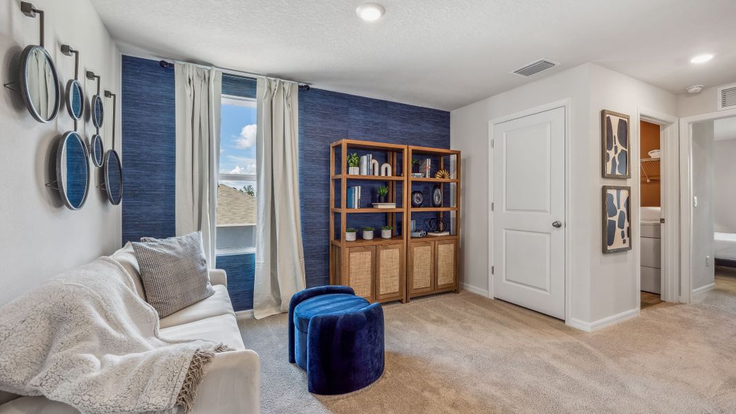 Furnished interior in a model home at Bella Lago in Parrish (Image 10).