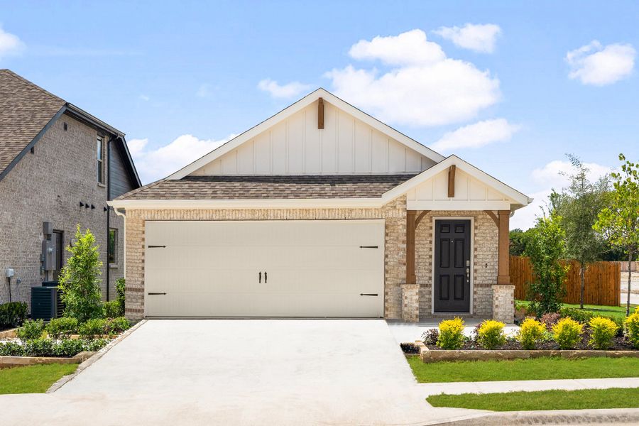 Front exterior of a home in the Saratoga community, located in Aubrey, TX (Image 3).