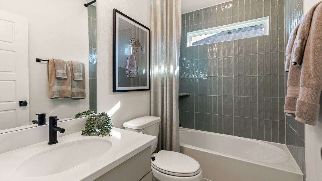 Furnished interior in a model home at Creekhaven in Iowa Colony (Image 28).