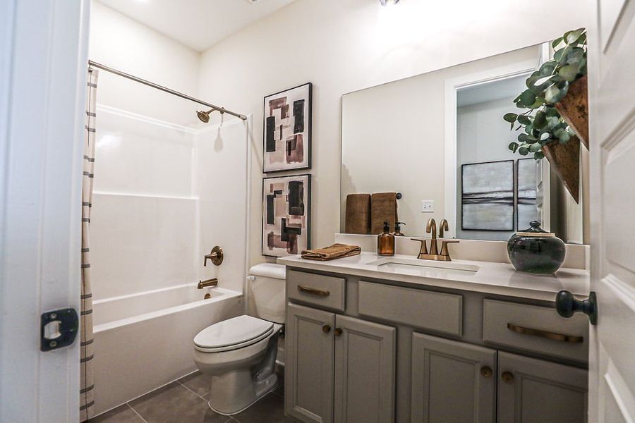 Furnished interior in a model home at Walker Farms in Bartlett (Image 38).