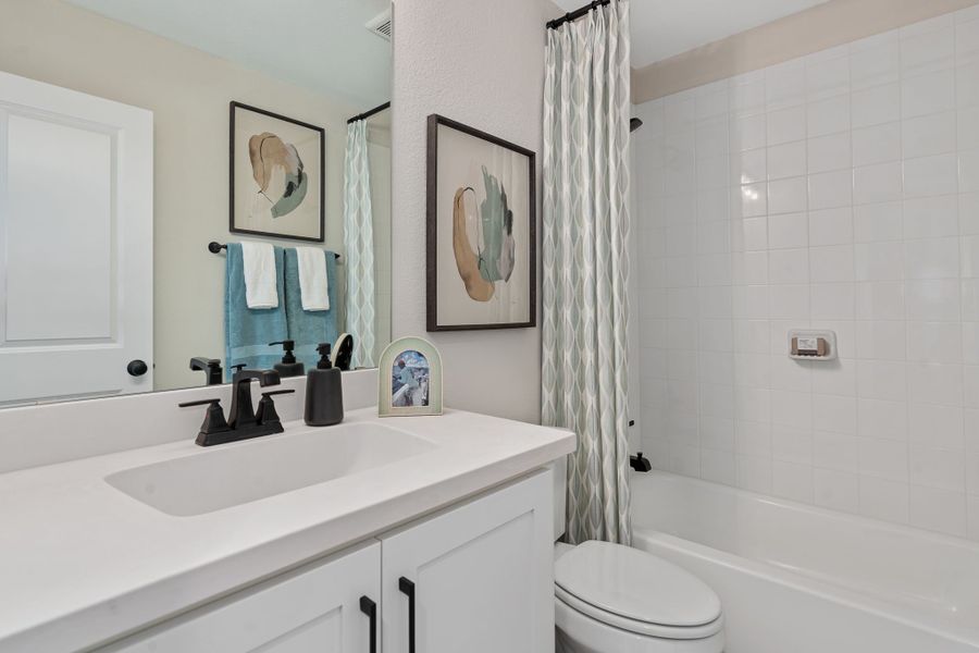 Furnished interior in a model home at Sweetgrass 50s in Haslet (Image 41).