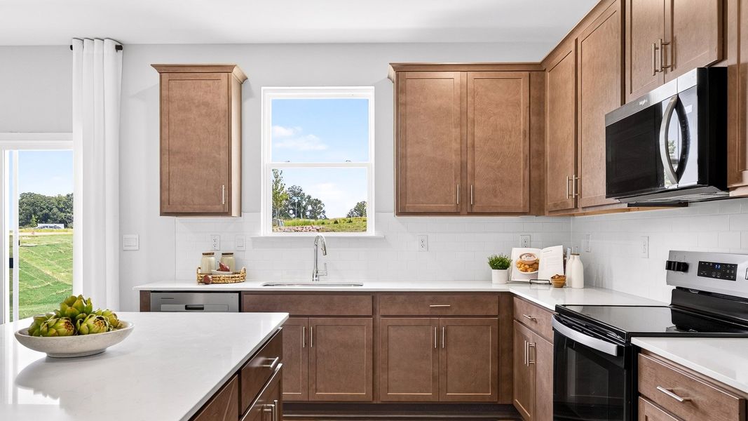 Furnished interior in a model home at Logan Farms in Mooresville (Image 9).