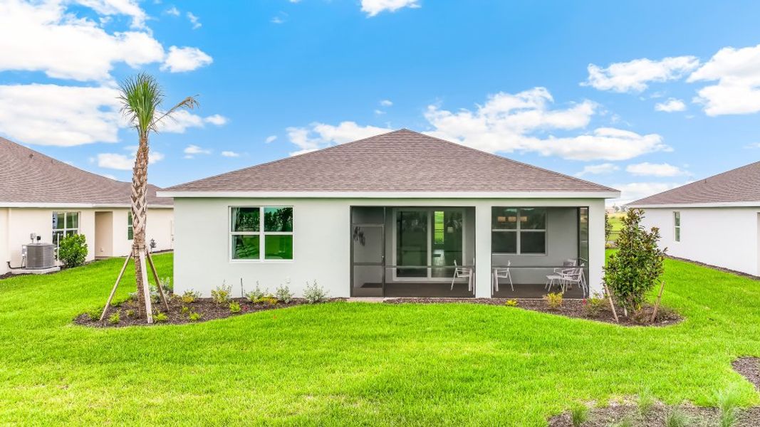 Front exterior of a home in the Palmetto Landing at Babcock Ranch community, located in Punta Gorda, FL (Image 10).