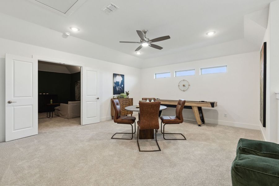 Furnished interior in a model home at Painted Tree Lakeside in McKinney (Image 36).
