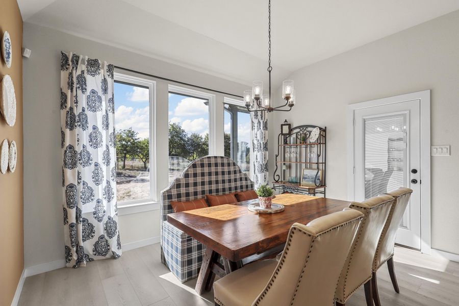 Furnished interior in a model home at Arbor Oaks in Boyd (Image 19).