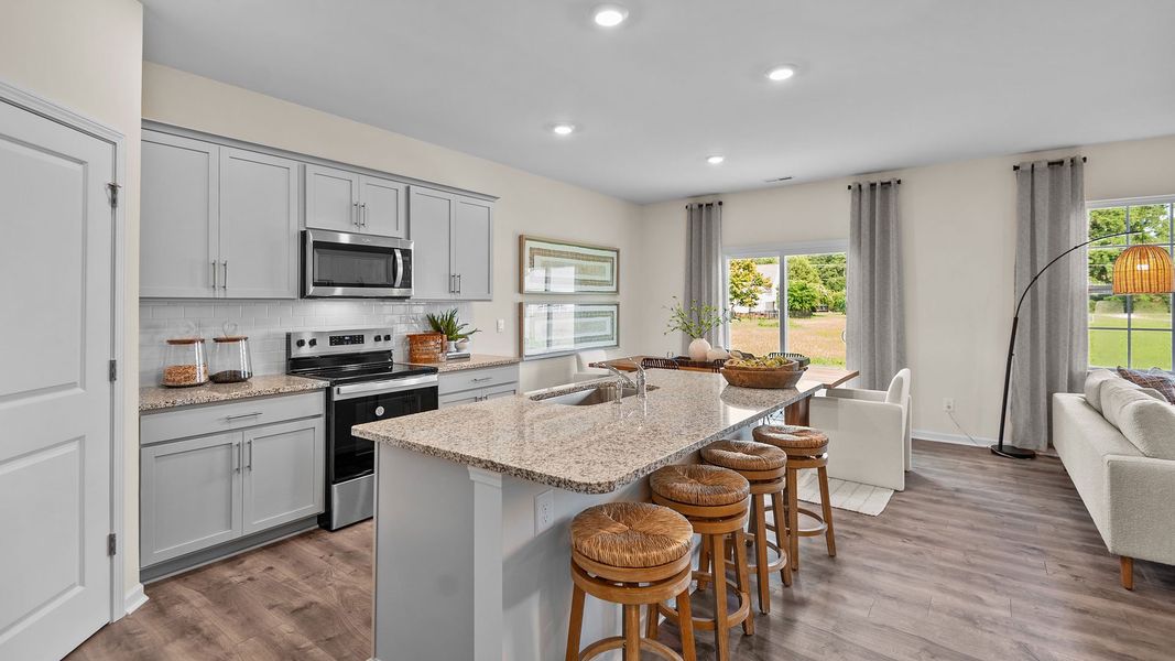 Furnished interior in a model home at The Preserve at Kinsley in Jamestown (Image 5).