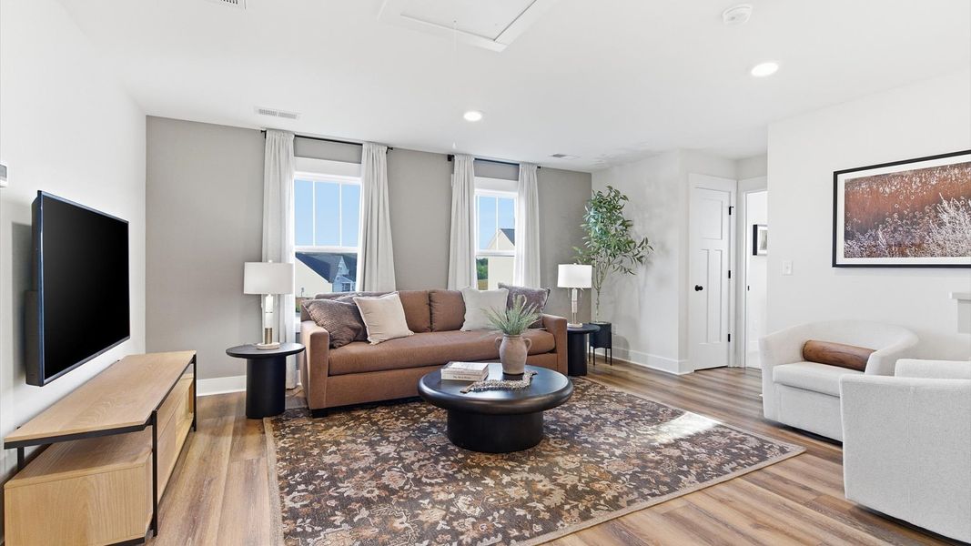 Furnished interior in a model home at Benjamin's Grove in Woodruff (Image 29).