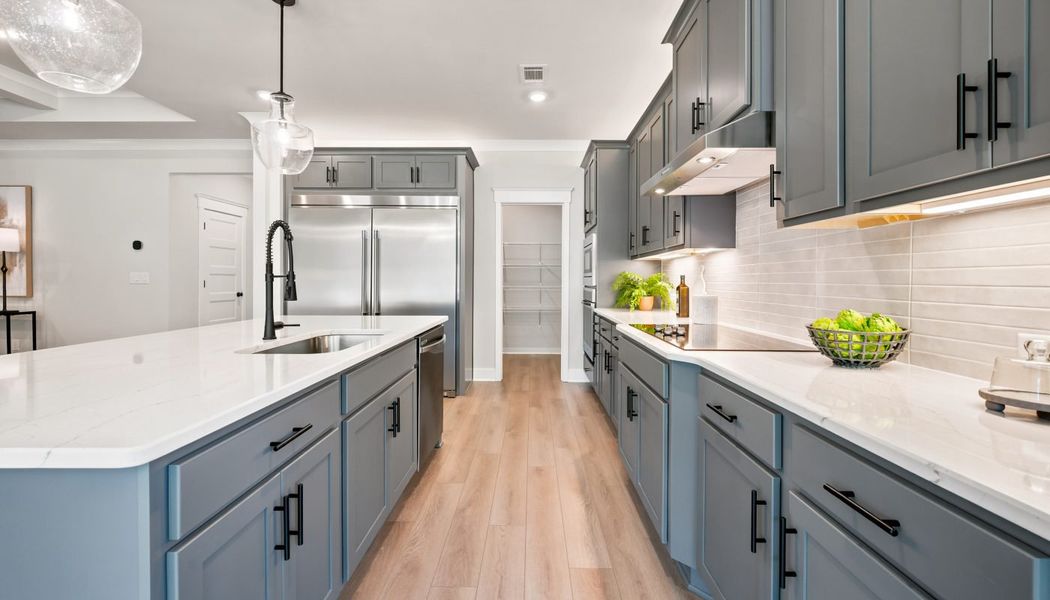 Furnished interior in a model home at Fowler Farms in Auburn (Image 73).