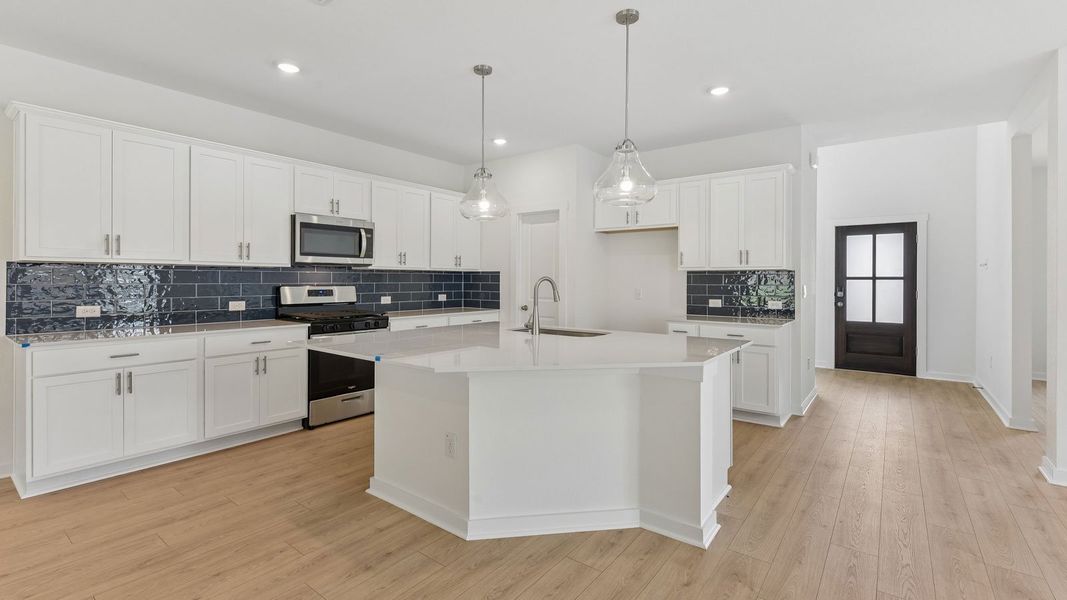 Furnished interior in a model home at Rosenbusch Ranch in Leander (Image 51).