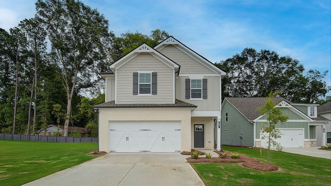 Front exterior of a home in the Enclave at Evergreen community, located in Fairburn, GA (Image 11).