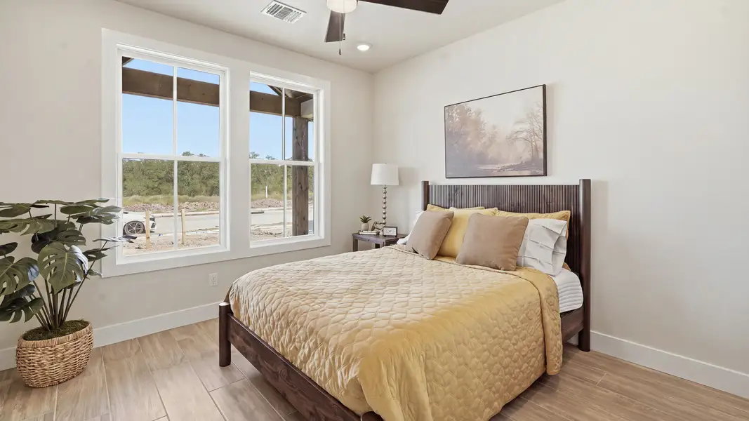 Furnished interior in a model home at Lakeside at Millican Reserve in College Station (Image 6). Furnished interior in a model home at Lakeside at Millican Reserve in College Station (Image 6).
