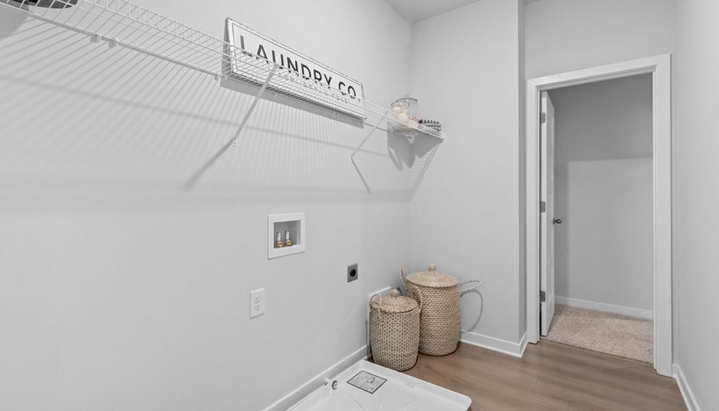 Furnished interior in a model home at Summerlin in Winder (Image 48).