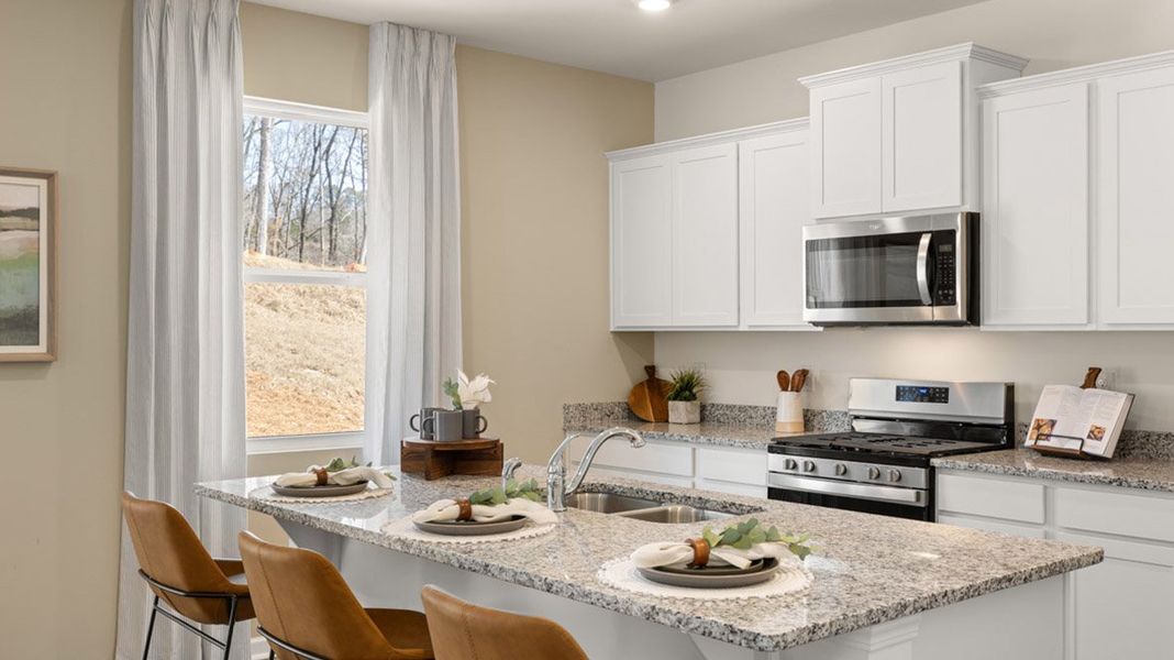 Furnished interior in a model home at Brooks Village in Dacula (Image 8).